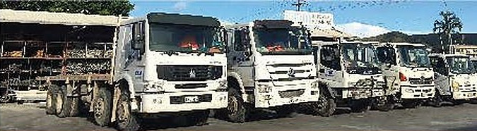 BNBM PNG delivery trucks at a branch yard